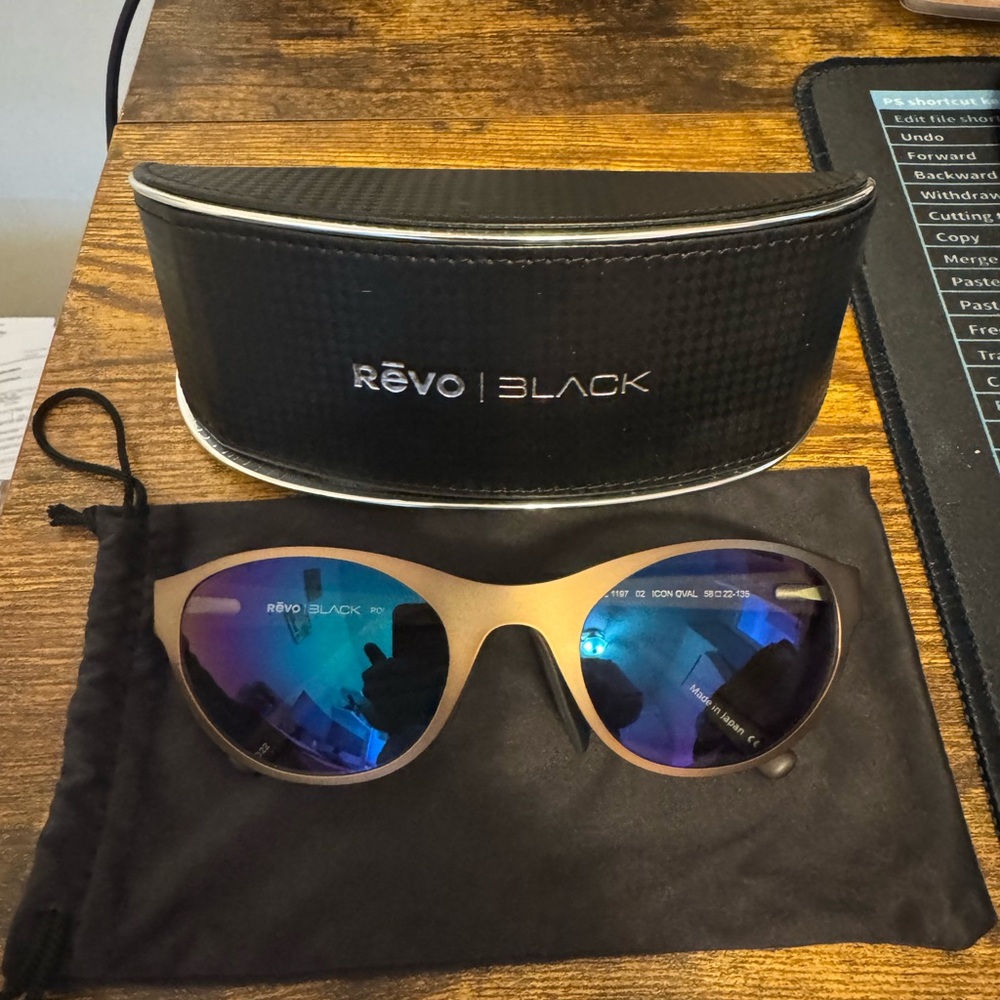 Revo Black Sunglasses with Blue Lenses